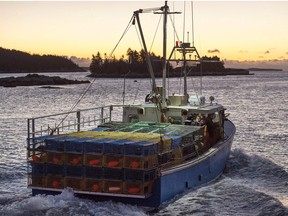 A fishing boat heads out from West Dover, Nova Scotia.