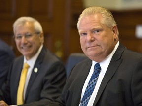 Ontario Finance Minister Vic Fedeli and Premier Doug Ford