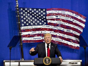 In April, U.S. President Donald Trump speaks during an event at Snap-On Tools Corp. headquarters in Wisconsin. He signed executive orders pushing for U.S. government to "Buy American" products, such as iron, steel and manufactured goods, when enforcing regulations and rules.