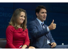 Canadian Prime Minister Justin Trudeau and Foreign Affairs Minister Chrystia Freeland participate in a panel discussion at the Council on Foreign Relations in New York, Tuesday, Sept. 25, 2018. U.S. President Donald Trump says he rejected a request for a one-on-one NAFTA meeting with Prime Minister Justin Trudeau this week because Canada's tariffs are too high and the country's trade negotiators have refused to budge.