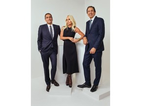 L-R: Jonathan Akeroyd, Donatella Versace, John D. Idol.