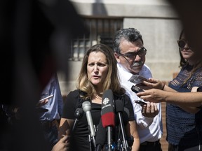 Chrystia Freeland, Canada's minister of foreign affairs, speaks to members of the media outside the U.S. Trade Representative office in Washington, D.C., U.S., on Wednesday, Sept. 5, 2018.