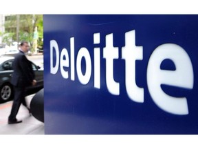 A new report by consultancy Deloitte is raising concerns about the number of lingering low-productivity firms in Canada that are hindering overall economic growth. A pedestrian walks past a Deloitte sign in downtown Ottawa on Tuesday, Sept. 20, 2011.