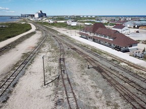 An aerial view of the rail line and Via Rail station is shown in Churchill, Man., Wednesday, July 4, 2018. The federal government is putting up $117 million to restore rail service to the town of Churchill in northern Manitoba.