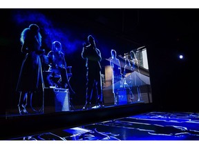 The late classical pianist Glenn Gould is returning to stages in digital form as part of a new deal struck with his estate. A hologram of Jackie Wilson, centre, and his band is projected for a crowd during a festival at Dundas Square in Toronto on Friday, June 8, 2018. The acclaimed Canadian performer, who died in 1982, will be resurrected as part of an optical illusion that performs alongside a live orchestra.