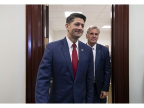 Speaker of the House Paul Ryan, R-Wis., left, and Majority Leader Kevin McCarthy, R-Calif., arrives for a news conference to talk about a defense funding bill moving in the House today, at the Capitol in Washington, Wednesday, Sept. 26, 2018.