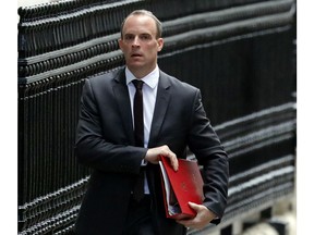 Dominic Raab, Secretary of State for Exiting the European Union, arrives for a cabinet meeting at Downing Street in London, Tuesday, Sept. 4, 2018.