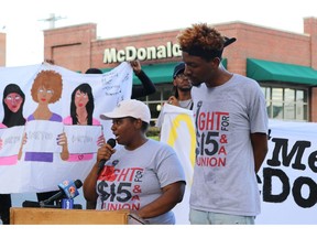 McDonald's worker Tanya Harrell, 22, speaks about sexual harassment in front of a downtown restaurant, not one where she had worked, in New Orleans on Tuesday, Sept. 18, 2018. McDonald's workers staged protests in several cities Tuesday as part of what organizers billed as the first multistate strike seeking to combat sexual harassment in the workplace.