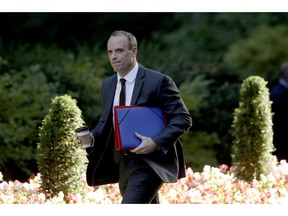 Britain's Secretary of State for Exiting the European Union Dominic Raab arrives for a cabinet meeting on Brexit at 10 Downing Street in London, Thursday, Sept. 13, 2018.