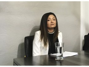 FILE - In this Dec. 8, 2017, file photo, Lourdes Matsumoto, left, speaks to reporters after settling a racial and sexual harassment tort claim with the Idaho State Controller's office in Boise, Idaho. A wave of sexual harassment complaints that accompanied the #MeToo movement is straining many of the state and local offices tasked with policing workplace discrimination of all kinds. In Idaho, a consistent uptick in sexual harassment allegations filed since October has burdened the state's Human Rights Commission, which hasn't seen a staff increase in decades. "These are very personal and very emotional issues, and an increase in resources is absolutely going to be paramount in the future," Matsumoto said.