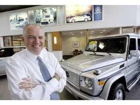 FILE - In this April 25, 2006, file photo, Mike Jackson, Chairman and Chief Executive Officer of AutoNation, poses at Mercedes-Benz of Fort Lauderdale in Fort Lauderdale, Fla. AutoNation's longtime CEO Jackson is stepping down from the automotive retailer.
