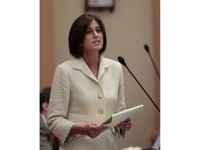 FILE - In this Aug. 31, 2012, file photo, state Sen. Mimi Walters, R-Lake Forest, speaks at the Capitol in Sacramento, Calif. One provision of the Republican tax overhaul looms large in several tight congressional races this fall. Walters, a Republican, embraces the tax law while reminding voters in her Orange County district that she helped convince House Speaker Paul Ryan not to eliminate the favored deduction altogether.