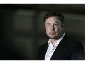 FILE- In this June 24, 2018, file photo Tesla CEO and founder of the Boring Company Elon Musk speaks at a news conference in Chicago. Shares of electric car maker Tesla Inc. tumbled over 9 percent as the markets opened Friday, Sept. 7, after the CEO smoked marijuana during a YouTube video podcast and the company's accounting chief left after a month on the job.