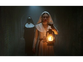 This image released by Warner Bros. Pictures shows Taissa Farmiga in a scene from "The Nun." (Warner Bros. Pictures via AP)