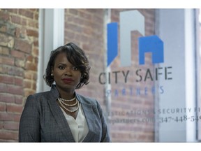 In this Sept. 7, 2018, photo Soyini Chan-Shue poses for a portrait at City Safe Partner's office in New York. Although Chan-Shue easily delegated work to police officers when she was a sergeant in the New York City Police Department, it was hard to relinquish tasks to employees of the security firm she now owns. "It can be nerve-wracking to give my staffers the autonomy to make decisions I formerly made, but I realized that I can't effectively grow my business if I don't," says Chan-Shue, CEO of City Safe Partners.