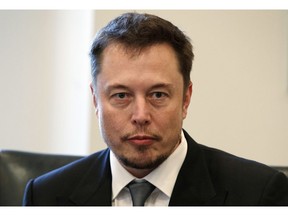 FILE - In this Dec. 14, 2016, file photo, Tesla CEO Elon Musk listens as President-elect Donald Trump speaks during a meeting with technology industry leaders at Trump Tower in New York. Electric carmaker Tesla must find a new chair for its board of directors under a settlement announced Saturday, Sept. 29, 2018, with the Securities and Exchange Commission. Whoever takes on the job will face the formidable task of overseeing Musk, a charismatic, visionary executive with an impulsive streak.