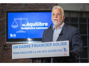 Liberal leader Philippe Couillard presents his party's financial platform in Montreal, on Wednesday, September 12, 2018.