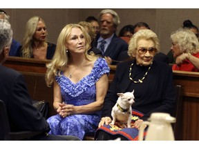 Abigail Kawananakoa, right, and her wife Veronica Gail Worth, appear in state court in Honolulu on Monday, Sept. 10, 2018. A judge has ruled that a 92-year-old Native Hawaiian heiress doesn't have sufficient mental capacity to manage her $215-million trust and is appointing First Hawaiian Bank to serve as her trustee.