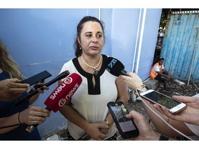 Television New Zealand journalist Barbara Dreaver speaks to the media after she was released by Nauru Police in Nauru, Tuesday, Sept. 4, 2018.  Nauru police detained the journalist for about three hours and revoked her forum accreditation after she interviewed a refugee outside a local restaurant.