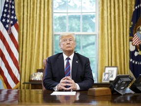 U.S. President Donald Trump during a phone conversation with Mexico's President Enrique Pena Nieto after the two countries struck a bilateral trade deal.