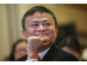 In this June 25, 2018, photo, Jack Ma, chairman of Alibaba Group attends the ceremony to launch a blockchain-base remittance solution in Hong Kong. Jack Ma, who founded e-commerce giant Alibaba Group and helped to launch China's online retailing boom, announced Monday, Sept. 10, 2018 that he will step down as the company's chairman next September. In a letter released by Alibaba, Ma said he will be succeeded by CEO Daniel Zhang. Ma handed over the CEO's post to Zhang in 2013 as part of what he said was a succession process developed over a decade. (Chinatopix via AP)