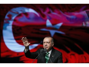 Turkey's President Recep Tayyip Erdogan gestures as he delivers a speech at a veterans' day event in Ankara, Turkey, Wednesday, Sept. 19, 2018.(Presidential Press Service via AP)