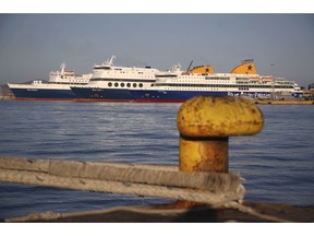 Ferries are docked during the second day of seamen's unions' strike at a port of Piraeus, near Athens, Tuesday, Sept. 4, 2018. Greek ferry crews on Monday decided to extend for at least one more day a strike that has left tens of thousands of travelers stranded on the country's popular island destinations.