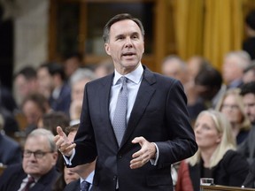 Finance Minister Bill Morneau responds during question period in the House of Commons on Parliament Hill in Ottawa on Thursday, Oct. 25, 2018.
