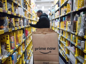 Amazon workers whose pay was already above US$15 per hour will get hourly raises of US$1, sources said.