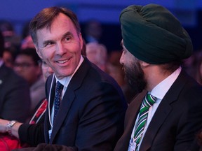 Prime Minister Trudeau asked seniors' minister Filomena Tassi to help Finance Minister Bill Morneau, left, and Minister of Innovation, Science and Economic Development Navdeep Bains on the design and implementation of initiatives to better protect consumers, particularly seniors, from high-pressure sales tactics, overbilling, fraud and other potential harms.