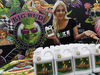 Haley Hudson promotes fertilizer for growing cannabis in her booth during the Cannabis World Congress at the Convention Center in Los Angeles, California.