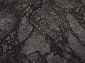Bitumen in an open mine area is shown at the historic Bitumount oil sands mining, separating and refining facility in Fort McMurray, Alberta.