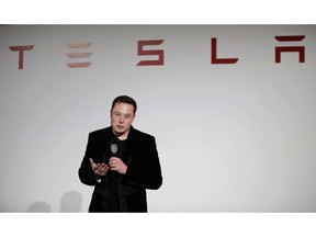 FILE - In this Sept. 29, 2015, file photo, Elon Musk, CEO of Tesla Motors Inc., talks about the Model X car at the company's headquarters, in Fremont, Calif. Electric auto brand Tesla Inc. says it has secured land in Shanghai for its first factory outside the United States, pushing ahead despite mounting U.S.-Chinese trade tensions. The company said it signed an agreement on a 210-acre (84-hectare) site.