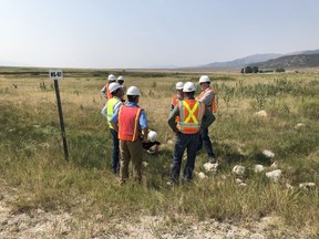 IUCN officials conducting field meeting with Newmont representatives on location in Nevada.