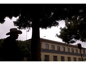 In this Wednesday, Sept. 5, 2018, photo, retired farmworker Alberto Alvarez is silhouetted as he strolls around downtown Salinas, Calif. Few cities exemplify California's housing crisis better than Salinas, an hour's drive from Silicon Valley and surrounded by farm fields. It's one of America's most unaffordable places to live, and many residents believe politicians lack a grip on the reality of the region's housing crisis.