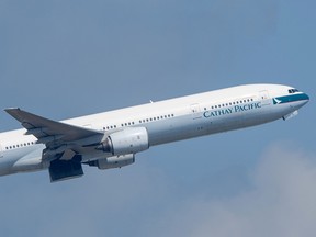 Shares in Hong Kong carrier Cathay Pacific plunged 6.5 per cent Thursday after it admitted to suffering a major data leak affecting up to 9.4 million passengers.