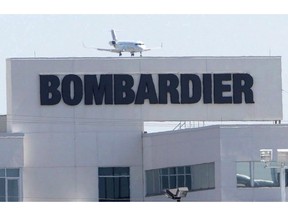 A plane comes in for a landing at a Bombardier plant in Montreal, Thursday, May 14, 2015. Bombardier Inc. says it has fulfilled more than 70 per cent of its business aircraft deliveries for the year, as a lengthening order backlog points to growing demand for long-range planes.THE CANADIAN PRESS/Ryan Remiorz