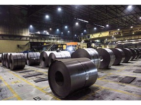 Rolls of coiled steel are seen at Canadian steel producer Dofasco in Hamilton Ont., Tuesday, March 13, 2018. A Canadian source close to the ongoing talks to resolve U.S. tariffs on steel and aluminum is insisting Canada is not about to agree to quotas or other limits on its exports in order to get the levies lifted.