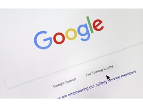 A cursor moves over Google's search engine page in Portland, Ore., on August 28, 2018. The federal privacy watchdog is asking a judge to clarify whether the law requires Google to remove web pages from its search engine results. The Federal Court of Canada test case involves a complaint from a man who alleges the company is breaching Canadian privacy law by prominently displaying links about him when his name is searched.