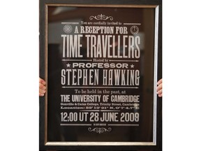 A poster advertising Time Travellers meeting hosted by Stephen Hawking, is one of the personal and academic possessions of Stephen Hawking at the auction house Christies in London, Friday, Oct. 19, 2018.  The online auction announced Monday Oct. 22, 2018, by auctioneer Christie's features 22 items from Hawking, including his doctoral thesis on the origins of the universe, with the sale scheduled for 31 October and 8 November.