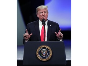 President Donald Trump addresses the International Association of Chiefs of Police at their annual convention Monday, Oct. 8, 2018, in Orlando, Fla.