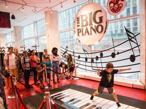 Children play on the "Big Piano," made famous by the movie Big, in FAO Schwarz’s former toy store in New York City.