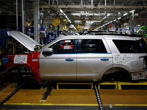 A Ford Motor Co. Expedition sports utility vehicle (SUV) moves down anassembly line at the Ford Kentucky Truck Plant in Louisville, Kentucky. The company is escalating criticism of President Donald Trump's steel tariffs.