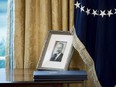 A photograph of Fred Trump, the father of U.S. President Donald Trump, is seen in the Oval Office of the White House in Washington, D.C.