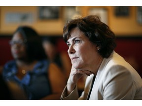 FILE - In this Sept. 29, 2018, file photo, Rep. Jacky Rosen, D-Nev. listens during a breakfast event at TC's Rib Crib as she campaigns in Las Vegas. One of the closest battles Senate races this year involves a neck-and-neck Nevada contest between incumbent Republican Dean Heller and Democrat Jacky Rosen, who will meet in their first and only debate Friday night Oct. 19, 2018, in Las Vegas.