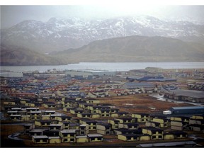 FILE - In this February 1997 file photo, hundreds of houses, which over 6,000 military personnel and dependents called home, along with schools, warehouses, hangars, and other structures sit empty on the Adak Naval Air Facility in Alaska. The Trump administration is considering using West Coast military bases or other federal properties as transit points for shipments of U.S. coal and natural gas to Asia.
