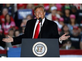 President Donald Trump speaks during a rally at Southern Illinois Airport Saturday, Oct. 27, 2018, in Murphysboro, Ill.