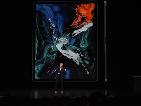 Tim Cook, CEO of Apple unveils a new iPad Pro with new Apple Pencil during a launch event at the Brooklyn Academy of Music on October 30, 2018 in New York City.