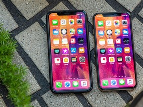 The 6.1-inch iPhone XR, left, is a bit larger than the 5.8-inch iPhone XS.