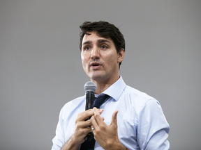 Prime Minister Justin Trudeau speaks about his government's new federally-imposed carbon tax in Toronto on Tuesday.